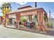 Covered patio area with seating near the pool at 4750 N Central Ave # N16, Phoenix, AZ 85012