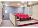 Community theater room with tiered seating and projector at 4750 N Central Ave # N16, Phoenix, AZ 85012