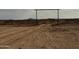 Entrance to the property with a metal gate at 48548 W Long Rifle Rd, Aguila, AZ 85320