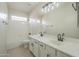 Bathroom with double vanity and updated fixtures at 532 N Bell Dr, Chandler, AZ 85225