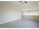 Bright loft area with ceiling fan and neutral wall colors at 532 N Bell Dr, Chandler, AZ 85225