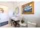 Bathroom with white sink, mosaic tile, and a framed art print at 533 W Lewis Ave, Phoenix, AZ 85003