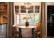 Cozy kitchen nook with a round table and two chairs at 533 W Lewis Ave, Phoenix, AZ 85003