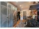 Kitchen with stainless steel appliances and a view into the adjacent bathroom at 533 W Lewis Ave, Phoenix, AZ 85003