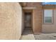 Modern front door entry with brick and stucco exterior at 5429 S 23Rd Dr, Phoenix, AZ 85041