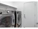 Laundry room with washer and dryer included at 5429 S 23Rd Dr, Phoenix, AZ 85041