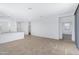 Open living space with kitchen island and tile flooring at 5429 S 23Rd Dr, Phoenix, AZ 85041