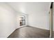 Bright bedroom with wood-look tile floors and mirrored closet doors at 5711 N 24Th Pl, Phoenix, AZ 85016