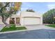 Tan stucco home with a two-car garage and well-maintained landscaping at 5711 N 24Th Pl, Phoenix, AZ 85016