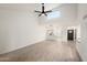 Bright living room with vaulted ceilings and a view into the kitchen at 5711 N 24Th Pl, Phoenix, AZ 85016