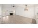 Living room with vaulted ceiling, fireplace, and tile flooring at 5711 N 24Th Pl, Phoenix, AZ 85016