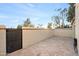 Private patio with a gate and brick pavers at 5711 N 24Th Pl, Phoenix, AZ 85016