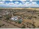 Aerial view showing a house, pool, and expansive desert landscape at 5713 W Sun Dance Dr, San Tan Valley, AZ 85144