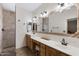 Elegant bathroom with double vanity and large mirror at 5713 W Sun Dance Dr, San Tan Valley, AZ 85144