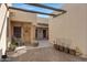 Inviting courtyard with rustic wooden accents and potted plants at 5713 W Sun Dance Dr, San Tan Valley, AZ 85144