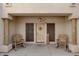 Charming entryway with wooden rocking chairs and star accents at 5713 W Sun Dance Dr, San Tan Valley, AZ 85144