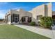 Covered patio with seating area and grassy yard at 5713 W Sun Dance Dr, San Tan Valley, AZ 85144