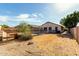 Large backyard with gravel landscaping and firepit at 5810 W Puget Ave, Glendale, AZ 85302