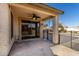 Covered patio, sliding glass doors, and pool access at 5810 W Puget Ave, Glendale, AZ 85302