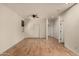 Spacious bedroom with light wood flooring and double door closet at 5810 W Puget Ave, Glendale, AZ 85302