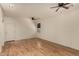 Bright bedroom with wood flooring and ceiling fan at 5810 W Puget Ave, Glendale, AZ 85302