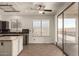 Kitchen with granite island, stainless steel appliances and tile floor at 5810 W Puget Ave, Glendale, AZ 85302