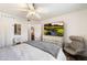 Spacious bedroom with large TV and comfortable seating at 5995 N 78Th St # 1015, Scottsdale, AZ 85250