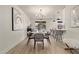 Bright dining area with a marble table and gray upholstered chairs at 615 W Enid Ave, Mesa, AZ 85210