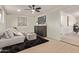 Relaxing sitting area with a gray couch and dark rug at 615 W Enid Ave, Mesa, AZ 85210