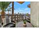 Relaxing balcony with city view, two chairs, and a small table at 6916 E 2Nd St, Scottsdale, AZ 85251