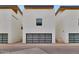 Modern garage with glass panel door and sleek design at 6916 E 2Nd St, Scottsdale, AZ 85251