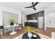 Modern kitchen with dark cabinetry, stainless steel appliances, and marble countertops at 6916 E 2Nd St, Scottsdale, AZ 85251