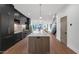 Modern kitchen with island and hardwood floors at 6916 E 2Nd St, Scottsdale, AZ 85251