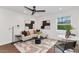 Bright and airy living room featuring modern furniture and large artwork at 6916 E 2Nd St, Scottsdale, AZ 85251