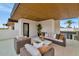 Relaxing rooftop patio with wicker furniture and city views at 6916 E 2Nd St, Scottsdale, AZ 85251