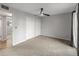 Bright bedroom with neutral walls and carpet flooring at 7443 E Taylor St, Scottsdale, AZ 85257