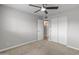 Spacious bedroom with double closets and ceiling fan at 7443 E Taylor St, Scottsdale, AZ 85257