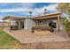 Patio with fire pit and comfortable seating area at 7443 E Taylor St, Scottsdale, AZ 85257