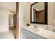 Guest Bathroom with vanity and mirror at 7550 E Ironwood Ct, Scottsdale, AZ 85258