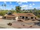 Single story home with two car garage and nicely landscaped yard at 7550 E Ironwood Ct, Scottsdale, AZ 85258