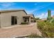 Landscaped backyard with gravel, desert plants, and patio at 7606 E Globemallow Ln, Gold Canyon, AZ 85118