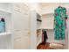 Large walk-in closet with shelves and hanging rods at 7606 E Globemallow Ln, Gold Canyon, AZ 85118