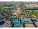 Aerial view of community with clubhouse, golf course, and tennis courts at 86 E Iloca Ln, Queen Creek, AZ 85140