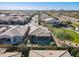 Aerial view showcasing the home's backyard and neighborhood setting at 86 E Iloca Ln, Queen Creek, AZ 85140