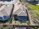 Aerial view showcasing home's backyard and solar panels at 86 E Iloca Ln, Queen Creek, AZ 85140