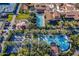 Aerial view of resort-style pool, tennis courts, and clubhouse at 86 E Iloca Ln, Queen Creek, AZ 85140