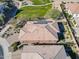 Aerial view of house with solar panels and surrounding landscape at 86 E Iloca Ln, Queen Creek, AZ 85140