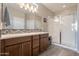 Bathroom with double vanity and large shower at 86 E Iloca Ln, Queen Creek, AZ 85140