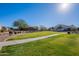 Green grassy community area with walking path at 86 E Iloca Ln, Queen Creek, AZ 85140