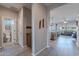 Bright entryway with tile floors, leading to living areas and a half bathroom at 86 E Iloca Ln, Queen Creek, AZ 85140